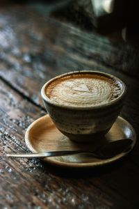 Close-up of cappuccino on table