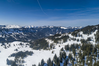 Panoramic view of snowcapped mountains against sky