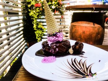 Close-up of cake served on table