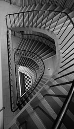 Directly below shot of spiral staircase in building