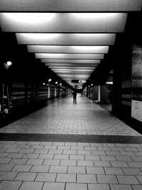 Woman walking on road