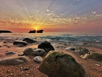 Scenic view of sea against sky during sunset