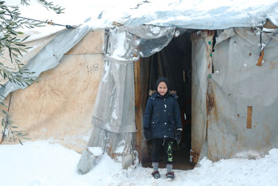 Syrian refugee children playing in the snow that fell on the camp near the syrian-turkish border.