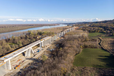 High angle view of bridge over landscape against sky