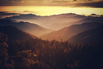 Scenic view of mountains against sky during sunset