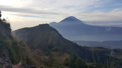 Scenic view of mountains against sky during sunset