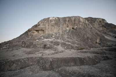 Scenic view of rocky mountains against clear sky