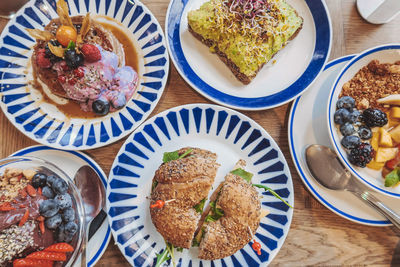 High angle view of breakfast served on table