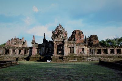 View of temple against cloudy sky