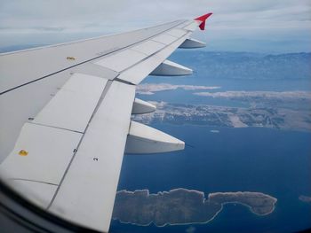 Airplane flying in sky