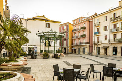 View of swimming pool against buildings