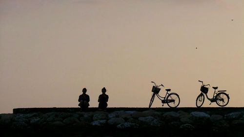 View of people at sunset