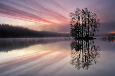 Sunrise over lake finnsjön, mölnlycke, sweden, europe