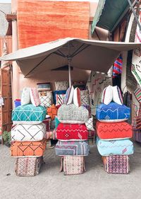 Multi colored chairs at market stall