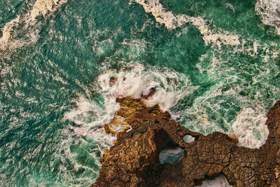 High angle view of rock formation at sea shore