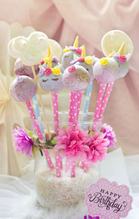 Close-up of cake with pink flowers