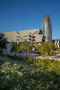 Buildings against clear sky