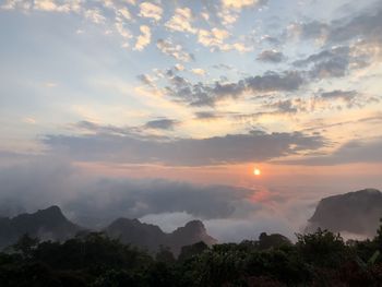 Scenic view of mountains against sky during sunset