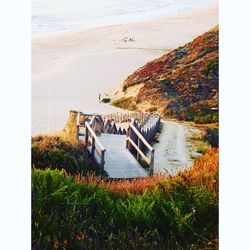 High angle view of staircase at beach