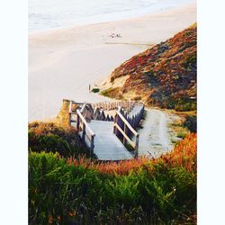 High angle view of staircase at beach