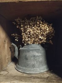 Close-up of illuminated flower vase on table