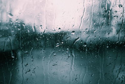 Close-up of water drops on glass