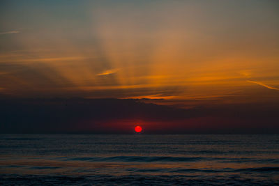 Scenic view of sunset over sea