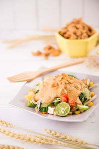 Close-up of salad in plate on table