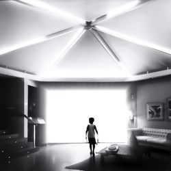 View of woman in dark room