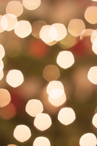 Defocused image of illuminated christmas tree