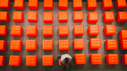 High angle view of men and text in row