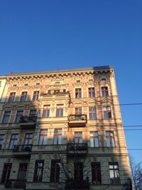 Low angle view of building against blue sky