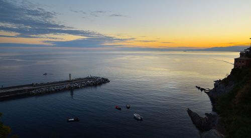 High angle view of sea against sky during sunset