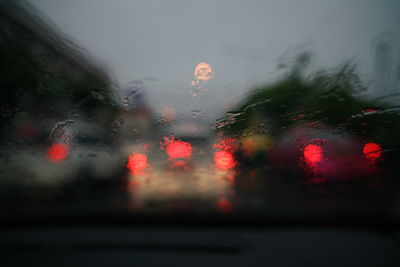 Wet glass window in rainy season