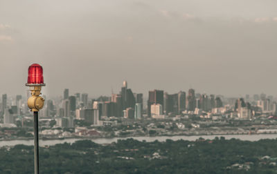 Buildings in city against sky