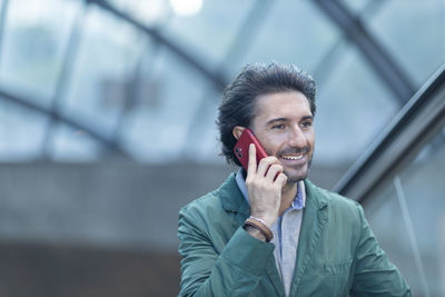 Young woman talking on phone