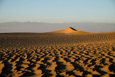 Scenic view of desert against sky