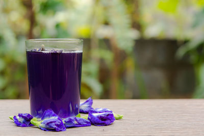 Close-up of drink on glass table