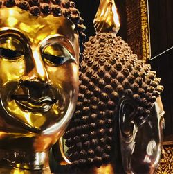 Close-up of buddha statue in temple