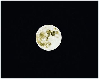 Scenic view of moon against clear sky at night