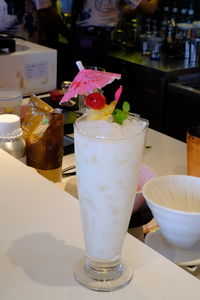 Close-up of drink served on table