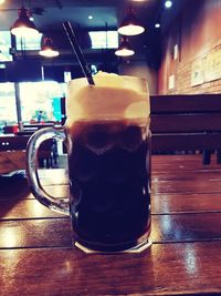 Close-up of beer in glass on table