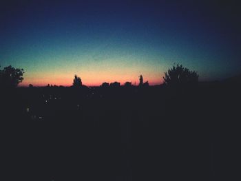 Silhouette trees at sunset