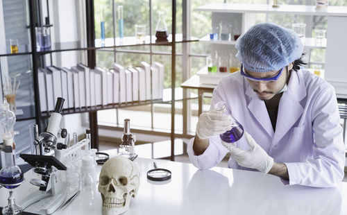 Full length of woman working