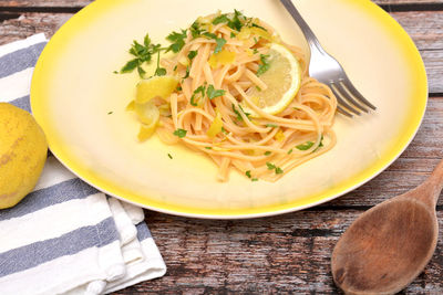 High angle view of pasta in plate on table