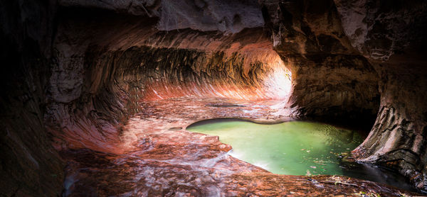 Rock formation in water tunnel view 