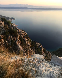 Scenic view of sea against sky during sunset