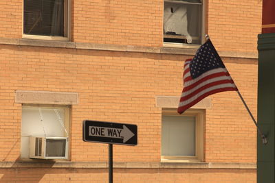 Close-up of flag against built structure