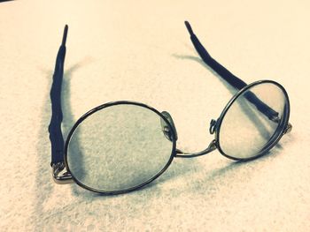 Close-up of eyeglasses on table