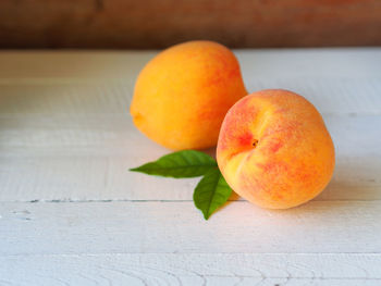 Close-up of peach on table